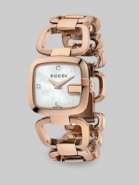From the G-Gucci Collection. A radiant goldtone timepiece with an elegant mother-of-pearl face and three diamond markers. Quartz movementWater resistant to 3 ATMSquare goldtone PVD case, 24mm (0.9) X 22.5mm (0.9)Smooth bezelMother-of-pearl dialThree diamond hour markers and 12, 6 and 9Goldtone PVD link braceletMade in Switzerland From the G-Gucci Collection. A radiant goldtone timepiece with an elegant mother-of-pearl face and three diamond markers. Quartz movementWater resistant to 3 ATMSquare goldtone PVD case, 24mm (0.9) X 22.5mm (0.9)Smooth bezelMother-of-pearl dialThree diamond hour markers and 12, 6 and 9Goldtone PVD link braceletMade in Switzerland