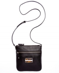 At once classic and contemporary, this compact crossbody from Calvin Klein is the ultimate go-anywhere accessory. Crafted from supple leather with signature hardware and plenty of pockets, it's ideally sized for all your girl on-the-go essentials. At once classic and contemporary, this compact crossbody from Calvin Klein is the ultimate go-anywhere accessory. Crafted from supple leather with signature hardware and plenty of pockets, it's ideally sized for all your girl on-the-go essentials.