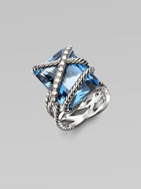 From the Cable Wrap Collection. A stunning London blue topaz is wrapped in cables and diamonds in sterling silver. London blue topazDiamonds, 0.42 tcwSterling silver Width, about ½Imported From the Cable Wrap Collection. A stunning London blue topaz is wrapped in cables and diamonds in sterling silver. London blue topazDiamonds, 0.42 tcwSterling silver Width, about ½Imported