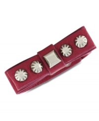Wrap up your fun new look with Jessica Simpson's PVC snap bracelet. Features a bow with silver tone stud detail. Crafted in pink PVC. Approximate length: 8 inches. Wrap up your fun new look with Jessica Simpson's PVC snap bracelet. Features a bow with silver tone stud detail. Crafted in pink PVC. Approximate length: 8 inches.