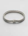 Sterling silver medium oval chain bracelet. Sterling silverSpring claspAbout 3 diam.Imported