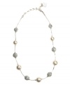 Add a chic appearance to your wardrobe with AK Anne Klein's shimmering strand necklace. Embellished with imitation glass pearls and sparkling crystal pave balls, it's crafted in imitation rhodium plated mixed metal. Approximate length: 16 inches + 3-inch extender.