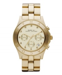 Strike gold with this luminous Blade watch by Marc by Marc Jacobs. Gold ion-plated stainless steel bracelet and round case. Bezel etched with logo. Gold tone chronograph dial features crystal accent markers, three subdials, date window, three hands and logo. Quartz movement. Water resistant to 50 meters. Two-year limited warranty. Strike gold with this luminous Blade watch by Marc by Marc Jacobs. Gold ion-plated stainless steel bracelet and round case. Bezel etched with logo. Gold tone chronograph dial features crystal accent markers, three subdials, date window, three hands and logo. Quartz movement. Water resistant to 50 meters. Two-year limited warranty.