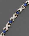 Exquisite gilded 18k gold over sterling silver is presented here in this striking Victoria Townsend bracelet, adorned with oval-cut sapphires (4 ct. t.w.). A perfect gift for the woman with a September birthday. Approximate length: 7 inches.