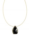 Become the object of admiration in this bold pendant. AK Anne Klein illusion necklace highlights a faceted, plastic jet bead. Bezel-setting and chain crafted in gold tone mixed metal. Approximate length: 16 inches. Approximate drop: 1-1/4 inches.