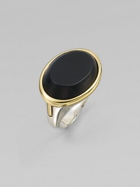 From the Saddle Collection. Sleek and dramatic, a beveled oval of matte black onyx is simply set in a frame of goldplated sterling silver, atop a bold sterling silver band.Black onyxSterling silver and goldplated sterling silverWidth, about ¾Imported
