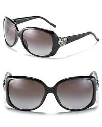 Shield your eyes in style. These classically elegant Gucci frames get an infusion of girly glamour thanks to double G heart logos at temples. Shield your eyes in style. These classically elegant Gucci frames get an infusion of girly glamour thanks to double G heart logos at temples.