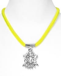 Crystal stones dress up this electric neon cord on this pendant necklace from nOir. Equal parts crafty and cool, it's the piece we want bright now. Crystal stones dress up this electric neon cord on this pendant necklace from nOir. Equal parts crafty and cool, it's the piece we want bright now.
