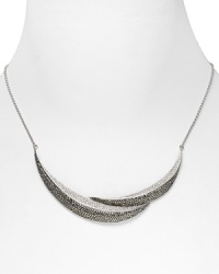 Let Judith Jack's elegant breastplate make a statement this season. The mixed metal look plays well with your favorite pieces. Let Judith Jack's elegant breastplate make a statement this season. The mixed metal look plays well with your favorite pieces.