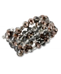 Hematite glass cherry beads adorn this moody coil bracelet from Kenneth Cole New York. Featuring black diamond crystal cup accents and glass crystals. Crafted in silver tone mixed metal. Approximate length: 7-1/2 inches. Hematite glass cherry beads adorn this moody coil bracelet from Kenneth Cole New York. Featuring black diamond crystal cup accents and glass crystals. Crafted in silver tone mixed metal. Approximate length: 7-1/2 inches.