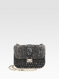 Truly sparkle in this ruby and crystal encrusted leather design.Adjustable single or double chain shoulder strap, 12¾-22¾ dropPush-lock flap closureOne inside zip pocketOne inside open pocketCotton lining8W X 5½H X 2¼DMade in Italy Truly sparkle in this ruby and crystal encrusted leather design.Adjustable single or double chain shoulder strap, 12¾-22¾ dropPush-lock flap closureOne inside zip pocketOne inside open pocketCotton lining8W X 5½H X 2¼DMade in Italy