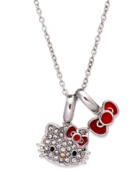 A defining statement, twice over. Hello Kitty's necklace, set in sterling silver, features pave crystals and an extra bow-what the iconic character is most known for. Approximate length: 18 inches. Approximate drop: 1/2 inch.