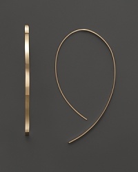 Elegant hoop earrings in 14K yellow gold from Lana. Elegant hoop earrings in 14K yellow gold from Lana.