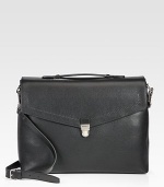 A serious statement piece for the modern man of style, impeccably crafted in lightly pebbled calfskin leather with a single gusset and silver buckle closure.Flap, buckle closureTop handleAdjustable shoulder strapInterior pocketsLeather17W x 12H x 6DMade in Italy