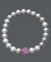 A traditional design receives a sparkling touch. Cultured freshwater pearls (8-9 mm) in shimmery grey hues adorn this chic stretch bracelet, while a purple crystal fireball adds extra glamour. Approximate diameter: 3-1/2 inches.