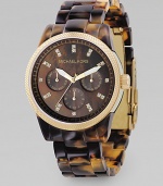 Deep earth tones style this sports watch with stainless steel case and CRYSTALLIZED - Swarovski Elements at each index. Face, about 1½ diameter Tortoise acrylic bracelet Mother-of-pearl dial Knurled bezel Multifunction movement Imported