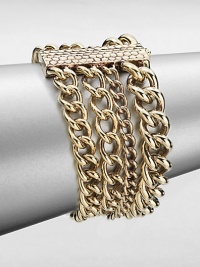 An elegant piece with link chains in various sizes gathered in a multi-row design. Antique-finished goldtoneLength, about 8Slide closureImported An elegant piece with link chains in various sizes gathered in a multi-row design. Antique-finished goldtoneLength, about 8Slide closureImported