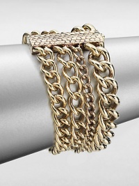 An elegant piece with link chains in various sizes gathered in a multi-row design. Antique-finished goldtoneLength, about 8Slide closureImported 