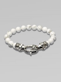 A new look for the modern man, handsomely crafted with a sterling silver raven's head clasp and a string of howlite beads.Sterling silverLobster claspBracelet, 9 longAbout 3 diamImported