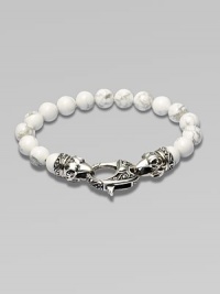 A new look for the modern man, handsomely crafted with a sterling silver raven's head clasp and a string of howlite beads.Sterling silverLobster claspBracelet, 9 longAbout 3 diamImported A new look for the modern man, handsomely crafted with a sterling silver raven's head clasp and a string of howlite beads.Sterling silverLobster claspBracelet, 9 longAbout 3 diamImported