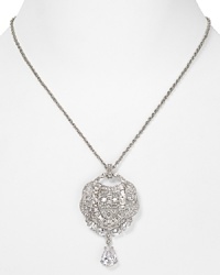 A gorgeous crystal-decked pendant defines this Carolee necklace, which hangs from a simply styled silvery chain. A gorgeous crystal-decked pendant defines this Carolee necklace, which hangs from a simply styled silvery chain.