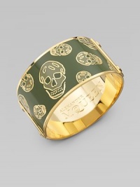 This feminine take on punk rock features creepy-cool skulls, stud details, and Alexander McQueen engraved logo on the interior and exterior.Enamel Brass Diameter, about 2½ Width, about 1¼ Made in Italy This feminine take on punk rock features creepy-cool skulls, stud details, and Alexander McQueen engraved logo on the interior and exterior.Enamel Brass Diameter, about 2½ Width, about 1¼ Made in Italy