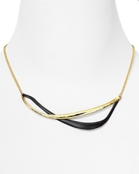 Alexis Bittar's intertwined gold necklace is a striking example of the label's contemporary edge. With modernism the mood, slip it on to transform a favorite tee shirt from basic to bold. Alexis Bittar's intertwined gold necklace is a striking example of the label's contemporary edge. With modernism the mood, slip it on to transform a favorite tee shirt from basic to bold.