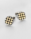 A handsome pair of sterling silver and 18kt-gold cuff links instantly adds modern artistry to your standard dress wardrobe.Sterling silver/18kt GoldAbout ¾ diam.Made in the United Kingdom