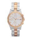 Marc by Marc Jacobs brings you the best of both worlds with this two-tone Henry watch. Stainless steel bracelet with rose-gold ion-plated center links and round case. Rose-goldtone bezel etched with logo. Silvertone chronograph dial features applied rose-goldtone numerals at markers, date window at three o'clock, three subdials, three hands and subtle logo. Quartz movement. Water resistant to 30 meters. Two-year limited warranty.