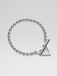 A graceful ball chain of sterling silver is capped by an open heart charm that also holds the toggle bar. Sterling silver Length, about 8 Heart diameter, about ¾ Toggle closure Made in Italy A graceful ball chain of sterling silver is capped by an open heart charm that also holds the toggle bar. Sterling silver Length, about 8 Heart diameter, about ¾ Toggle closure Made in Italy