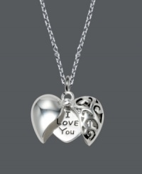 The secret's out -- you're in love! This hidden message pendant by Unwritten is the perfect way to express your feelings. An intricate, filigree heart opens to reveal the words, I Love You. Crafted in sterling silver. Approximate length: 18 inches. Approximate drop: 3/4 inch. The secret's out -- you're in love! This hidden message pendant by Unwritten is the perfect way to express your feelings. An intricate, filigree heart opens to reveal the words, I Love You. Crafted in sterling silver. Approximate length: 18 inches. Approximate drop: 3/4 inch.