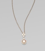 Five dazzling diamonds accent this round Akoya pearl pendant on a sleek 18k white gold link chain. 8MM white, round, Akoya pearlDiamonds, .35 tcwLength, about 18Pendant size, about 1¾ Lobster clasp closureImported 