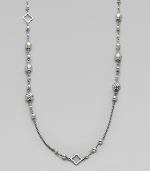 From the Quatrefoil Collection. An extra long sterling silver chain with bead and quatrefoil stations.Sterling silver Can be worn doubled Length, about 48 Lobster clasp closure Imported 