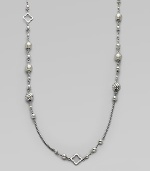 From the Quatrefoil Collection. An extra long sterling silver chain with bead and quatrefoil stations.Sterling silver Can be worn doubled Length, about 48 Lobster clasp closure Imported 