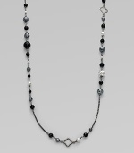 From the Quatrefoil Collection. An extra long sterling silver chain with bead and quatrefoil stations.Black onyx & hematite Sterling silver Can be worn doubled Length, about 48 Lobster clasp closure Imported 