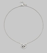 From the Love Britt Collection. Interlocking G heart pendant is front and center along a simple bead chain.Sterling silver Length, about 14 with 1 extender Width of pendant, about ¾ Lobster clasp closure Made in Italy 