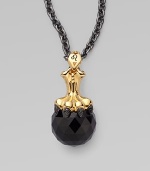 A goldplated sterling silver lion claw, complete wit pavé black cubic zirconia, looms over a jet crystal, strung on a long elegant chain.Jet crystal Cubic zirconia Goldplated sterling silver Black rhodium plated sterling silver Chain length, about 30 Pendant width, about 1½ Lobster clasp Imported