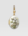Diamond-like CRYSTALLIZED - Swarovski Elements sparkle on this handcrafted, hand-enameled birthstone locket that opens to hold a favorite photo. Crystal Enamel 18k goldplated brass & brass-plated pewter Month indicated on the back Length, about 1¼ Width, about 1 Spring clip clasp Made in USA