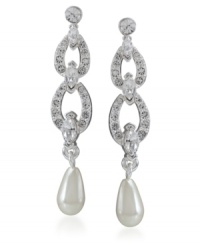 Grace and elegance combine in these flowing drops. Carolee earrings feature crystal droplets and two shimmery glass pearls crafted in mixed metal. Approximate drop: 1-1/2 inches. Grace and elegance combine in these flowing drops. Carolee earrings feature crystal droplets and two shimmery glass pearls crafted in mixed metal. Approximate drop: 1-1/2 inches.