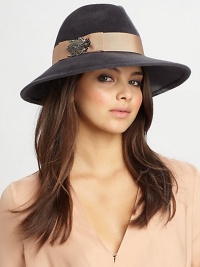 Midnight velour portrait felt fedora with ribbon trim and crystal insect detail.Felted rabbit furSpot cleanMade in USA Midnight velour portrait felt fedora with ribbon trim and crystal insect detail.Felted rabbit furSpot cleanMade in USA