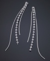 Take your style to new lengths with these stunning GUESS earrings featuring beautiful strands of crystal accents set in silvertone mixed metal. Approximate drop: 4 inches.
