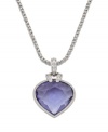 Splash your neckline with this lovable heart pendant in a bright pool of color. Swarovski necklace features a heart-shaped oceanic tanzanite set in silver tone mixed metal with clear crystal accents at the bail. Approximate length: 15-7/8 inches. Approximate drop: 1-3/4 inches.