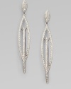 EXCLUSIVELY AT SAKS. An elegant, curvaceous creation of sparkling crystals.Crystal Rhodium plated Drop, about 3 Post and clutch backs Imported