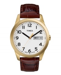Modern traditional. The classic watch by Timex sports a round goldtone mixed metal case and sophisticated crocodile-embossed leather strap in versatile brown. White Indiglo dial with black numerals and hour and minute hands. Day/date window. Water resistant to 30 meters. One-year limited warranty. Modern traditional. The classic watch by Timex sports a round goldtone mixed metal case and sophisticated crocodile-embossed leather strap in versatile brown. White Indiglo dial with black numerals and hour and minute hands. Day/date window. Water resistant to 30 meters. One-year limited warranty.