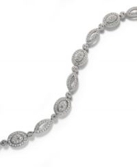 Seamless sparkle adds the perfect last-minute touch. Eliot Danori's stunning all-around crystal Windsor bracelet is set in rhodium-plated mixed metal for shine that lasts a lifetime. Approximate length: 7-1/4 inches.