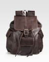 An instant upgrade to any casual ensemble, this stylish backpack crafted from full grain, enzyme-washed vachetta leather, is designed with a roomy interior and ample exterior pockets to securely store your essentials in style.Flap, drawstring closureTop handleExterior flap pocketsInterior zip pocketCotton twill/leather liningLeather17W x 12H x 6DImported