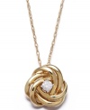 He loves me, he loves me knot. The perfect symbol of affection, this Wrapped in Love™ pendant features swirls of 14k gold surrounding a single, round-cut diamond (1/10 ct. t.w). Approximate length: 18 inches. Approximate drop: 1/2 inch.
