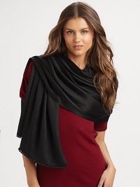 Hand-woven and hand-dyed cashmere/silk wrap reverses from a matte to a shine. Woven satin ball fringe 78L X 22W Imported Hand-woven and hand-dyed cashmere/silk wrap reverses from a matte to a shine. Woven satin ball fringe 78L X 22W Imported