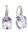 The perfect pop of purple. Victoria Townsend's stunning sterling silver earrings feature X-cut amethyst (4-3/4 ct. t.w.) and glittering diamond accents. Approximate drop: 3/4 inch. Approximate diameter: 3/8 inch.