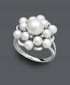 Stay in style with the latest trend in statement rings. This chic cluster features polished cultured freshwater pearls (4-8 mm) and sparkling diamond accents. Crafted in sterling silver. Size 7.